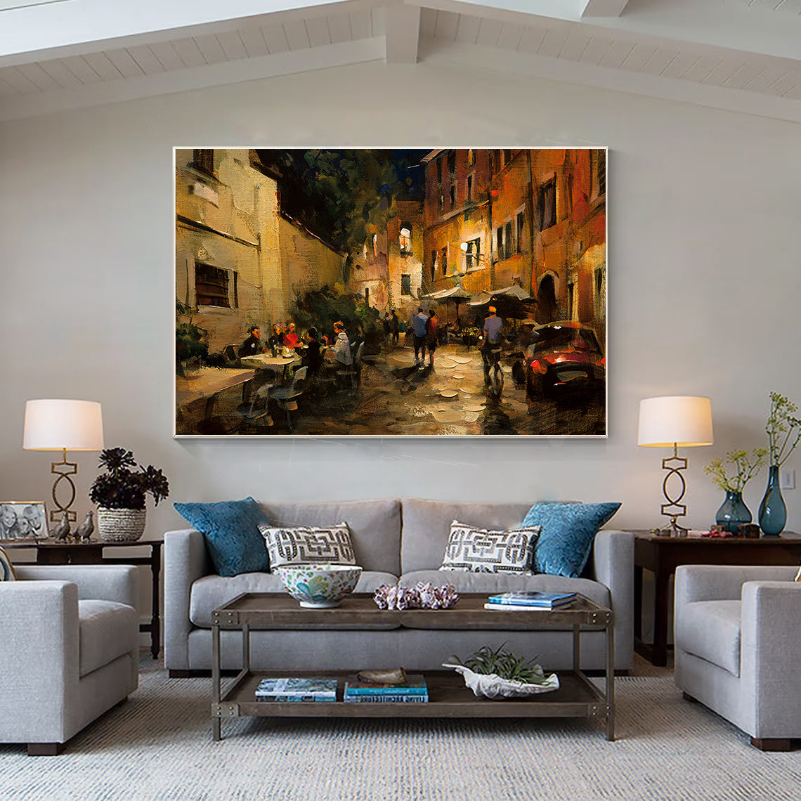 a living room filled with furniture and a painting on the wall
