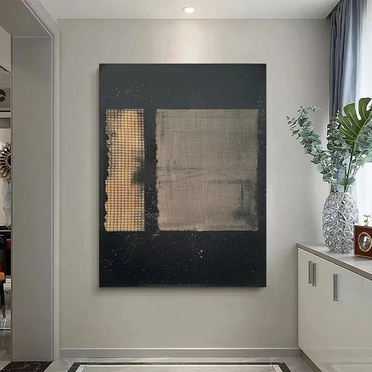 a large abstract painting hanging on a wall in a room.