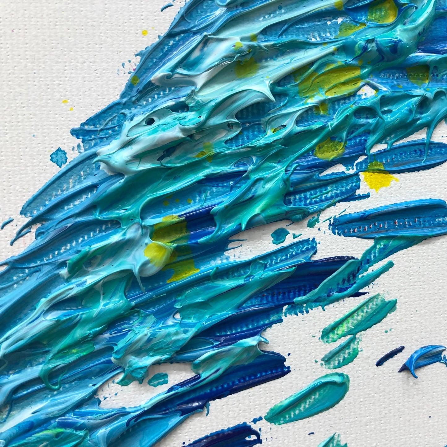 The image is an abstract painting with a vibrant mix of blue and yellow colors, creating a dynamic and energetic composition.
