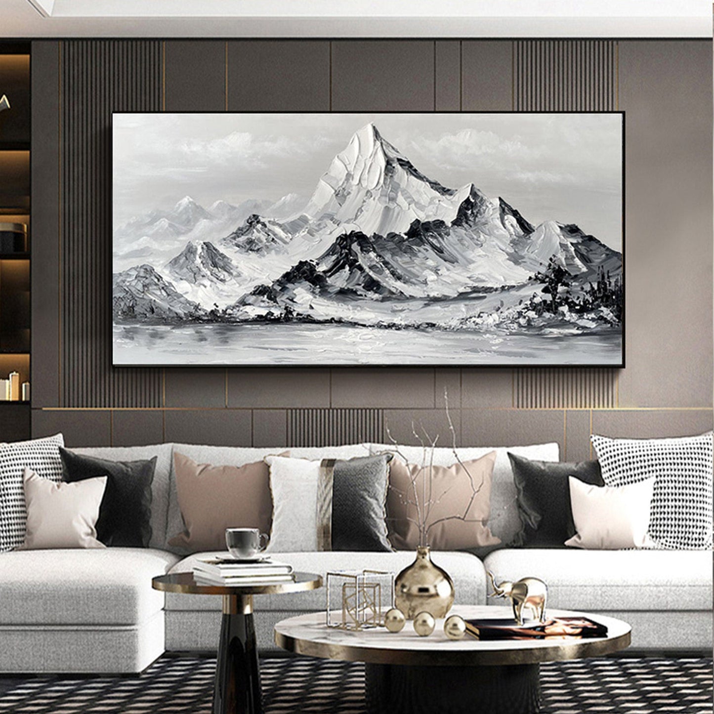 a living room with a large painting on the wall