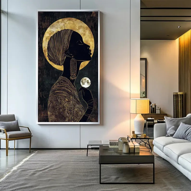 a large, dark-colored portrait of a woman with a headdress, hanging on a white wall in a modern living room setting.