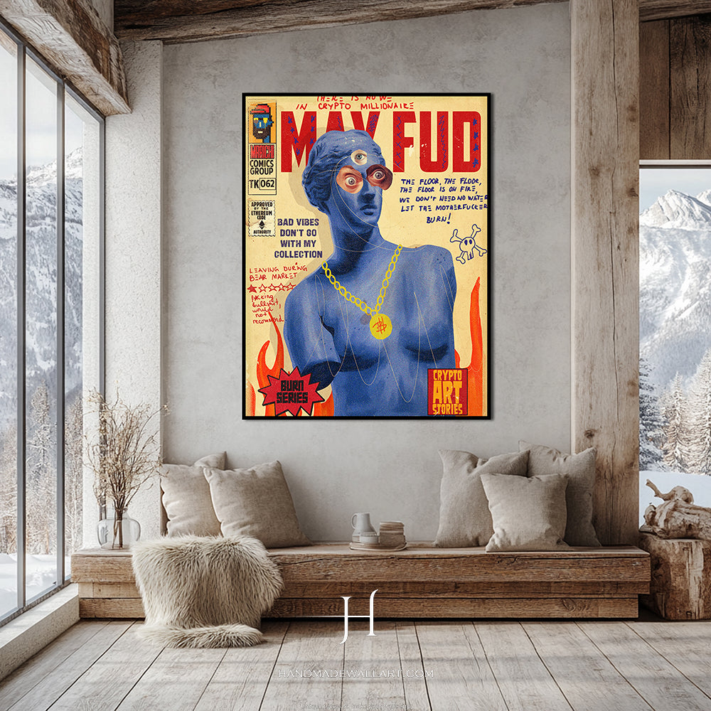 a living room with a couch and a poster on the wall