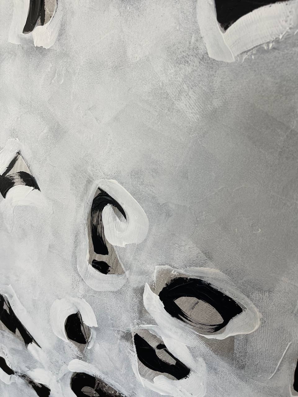 an abstract painting of black and white shapes