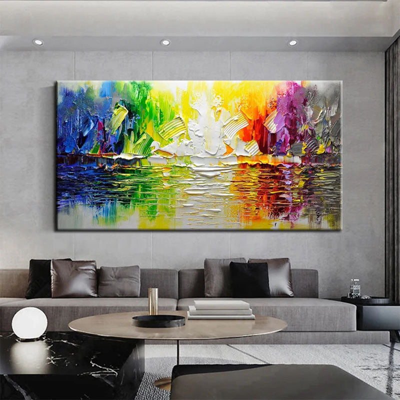 a living room with a large painting on the wall