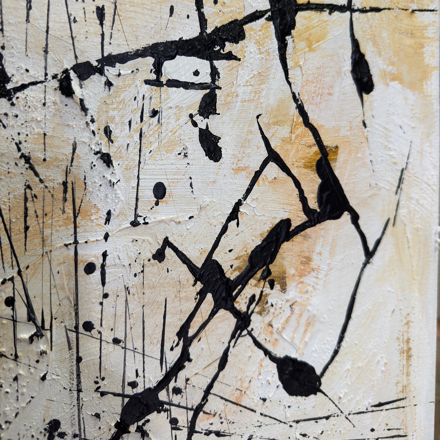 The image is an abstract painting with bold black splatters and drips across a white background.