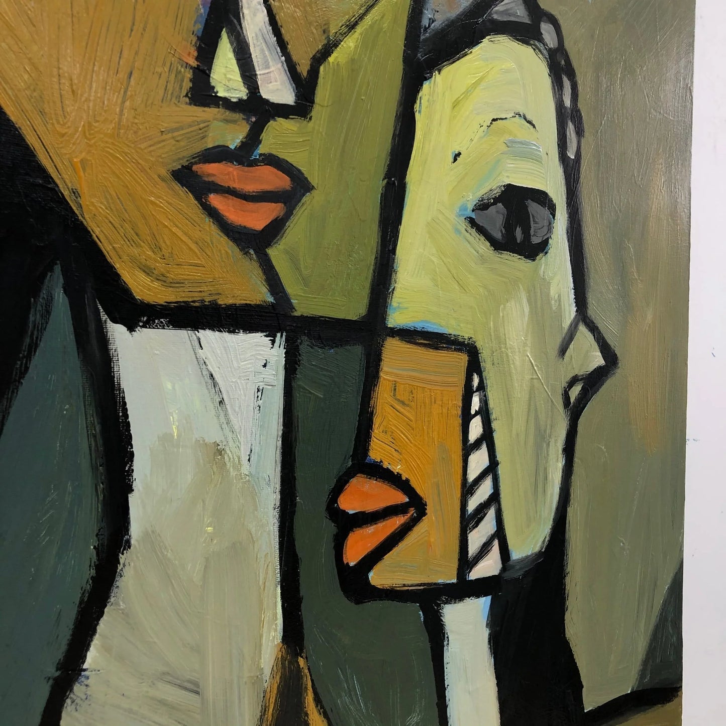 The image is an abstract painting featuring two stylized human faces with bold, geometric shapes and colors.