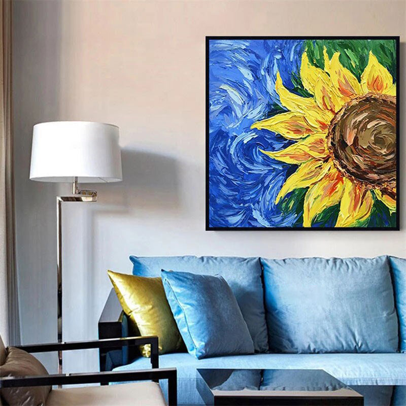 a living room with a couch and a painting on the wall