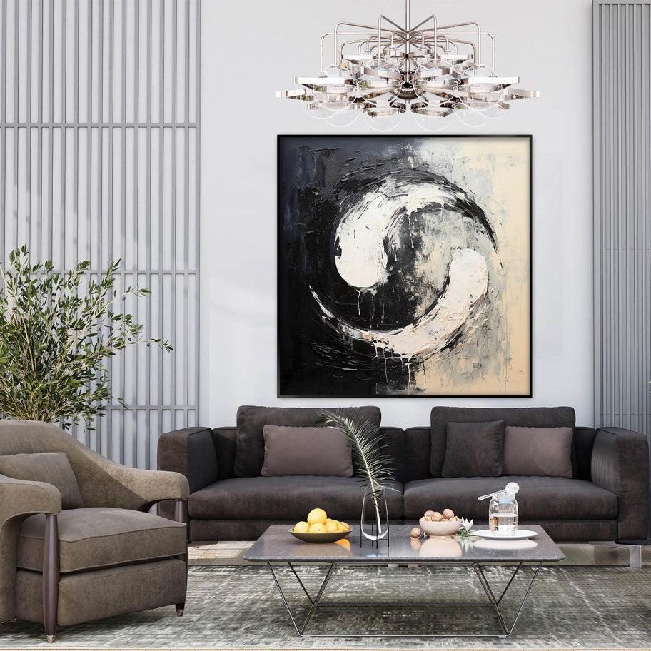 a living room filled with furniture and a painting on the wall