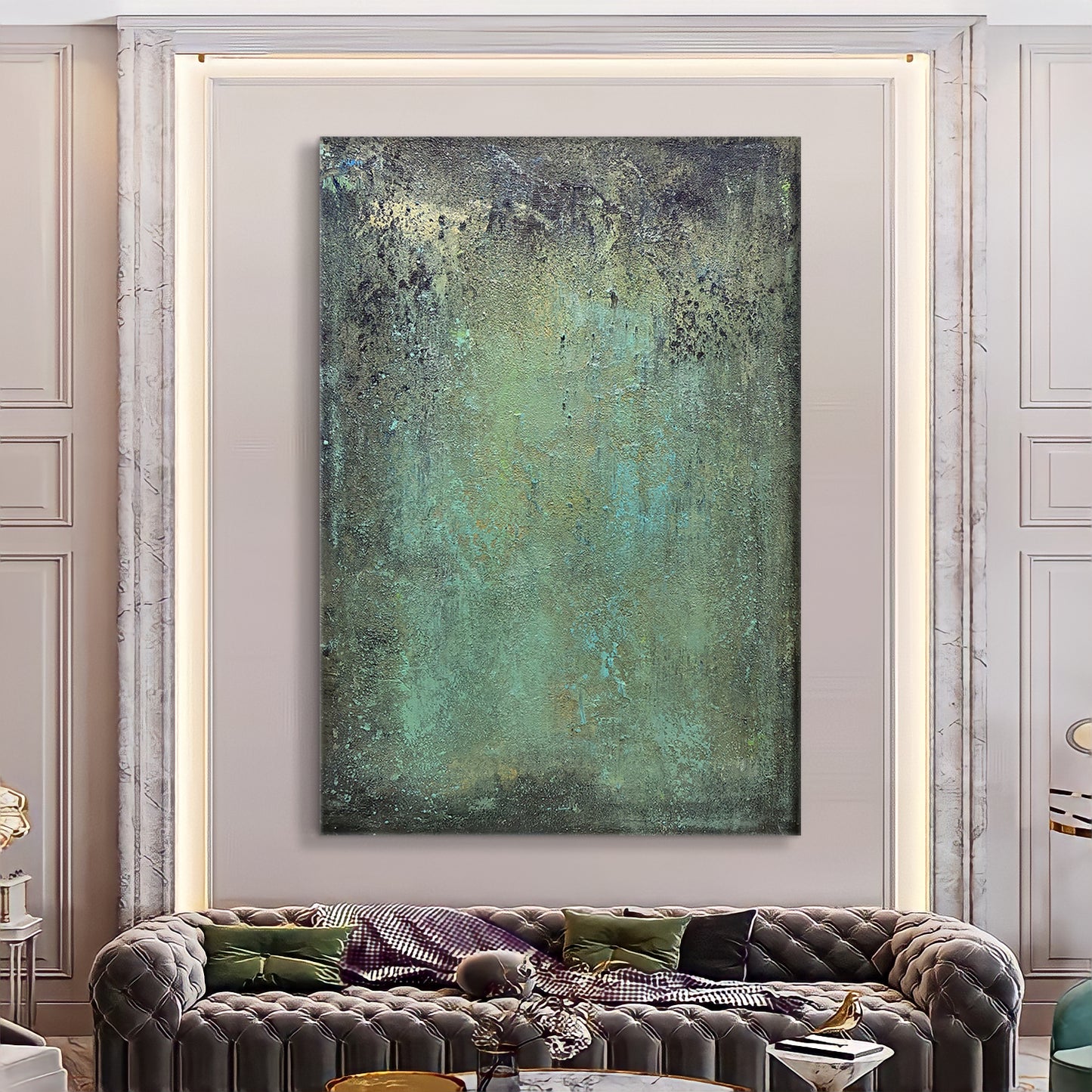 a living room with a couch and a painting on the wall