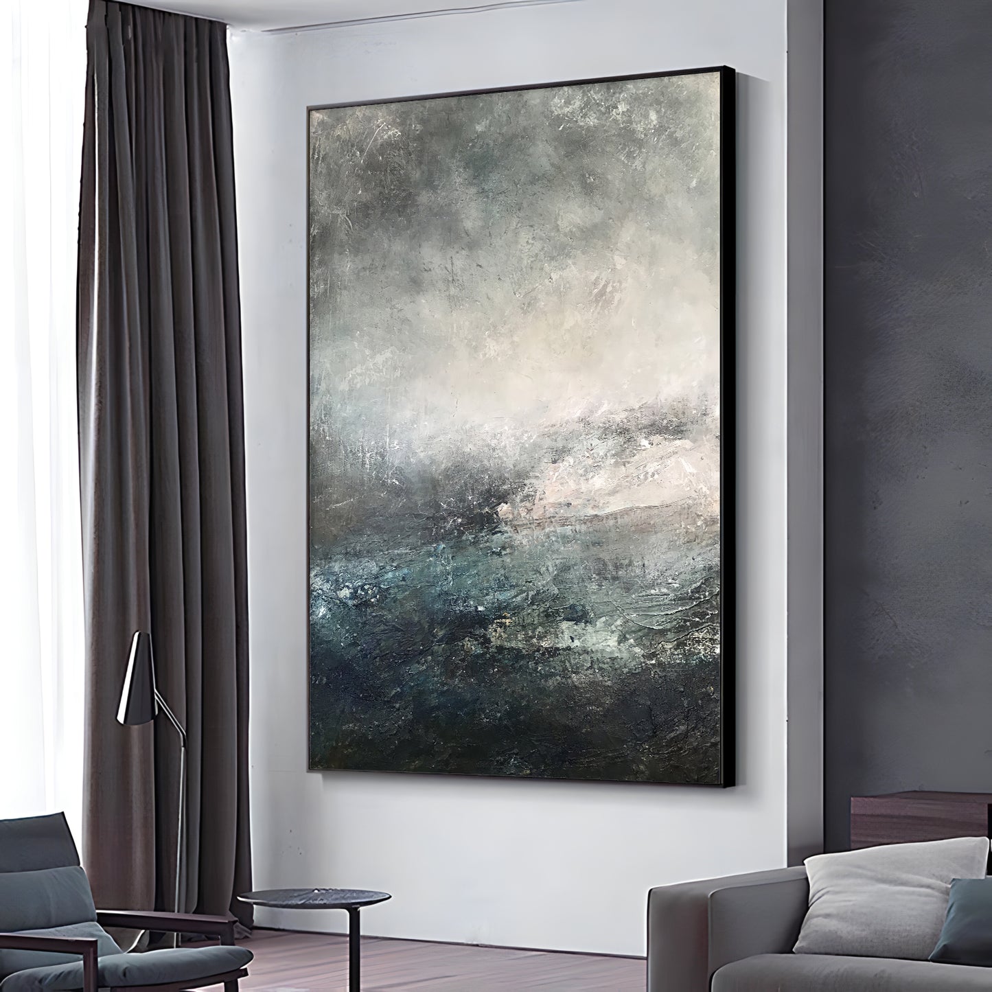 a living room with a couch and a painting on the wall