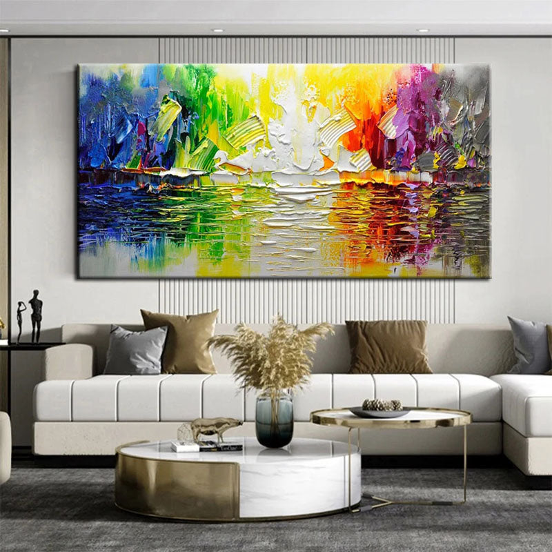 a living room with a large painting on the wall