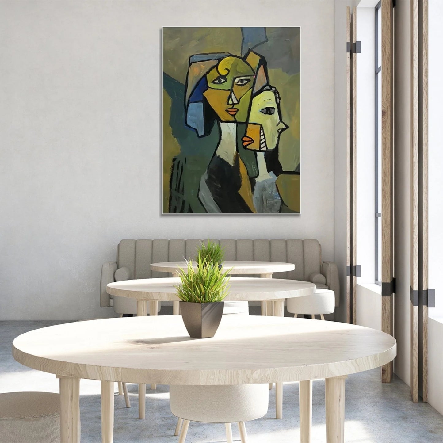 a modern dining area with a large abstract painting hanging on the wall above a white table with a potted plant on it.
