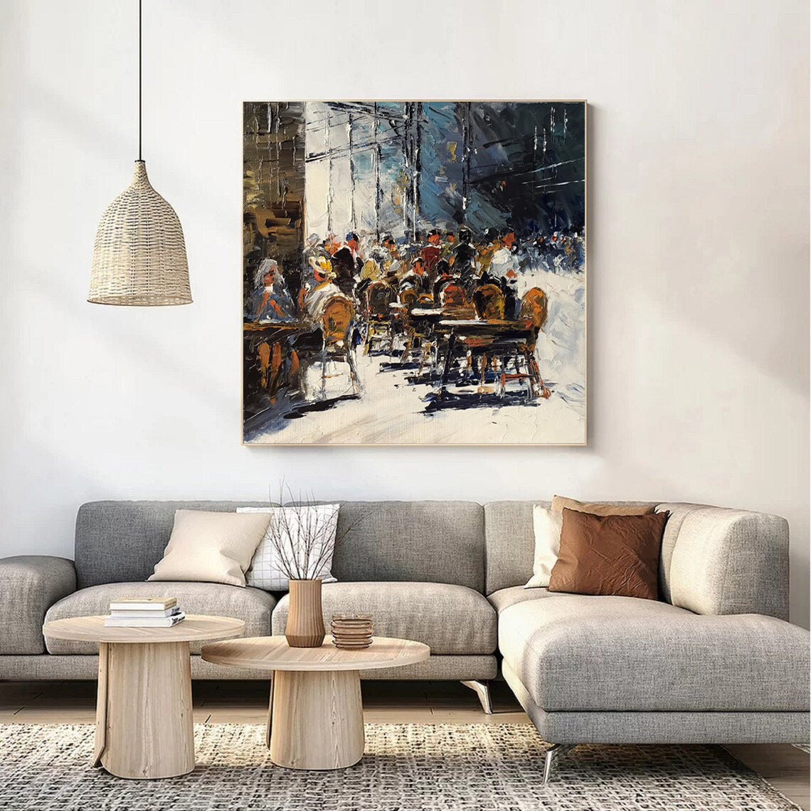 a living room with a couch and a painting on the wall