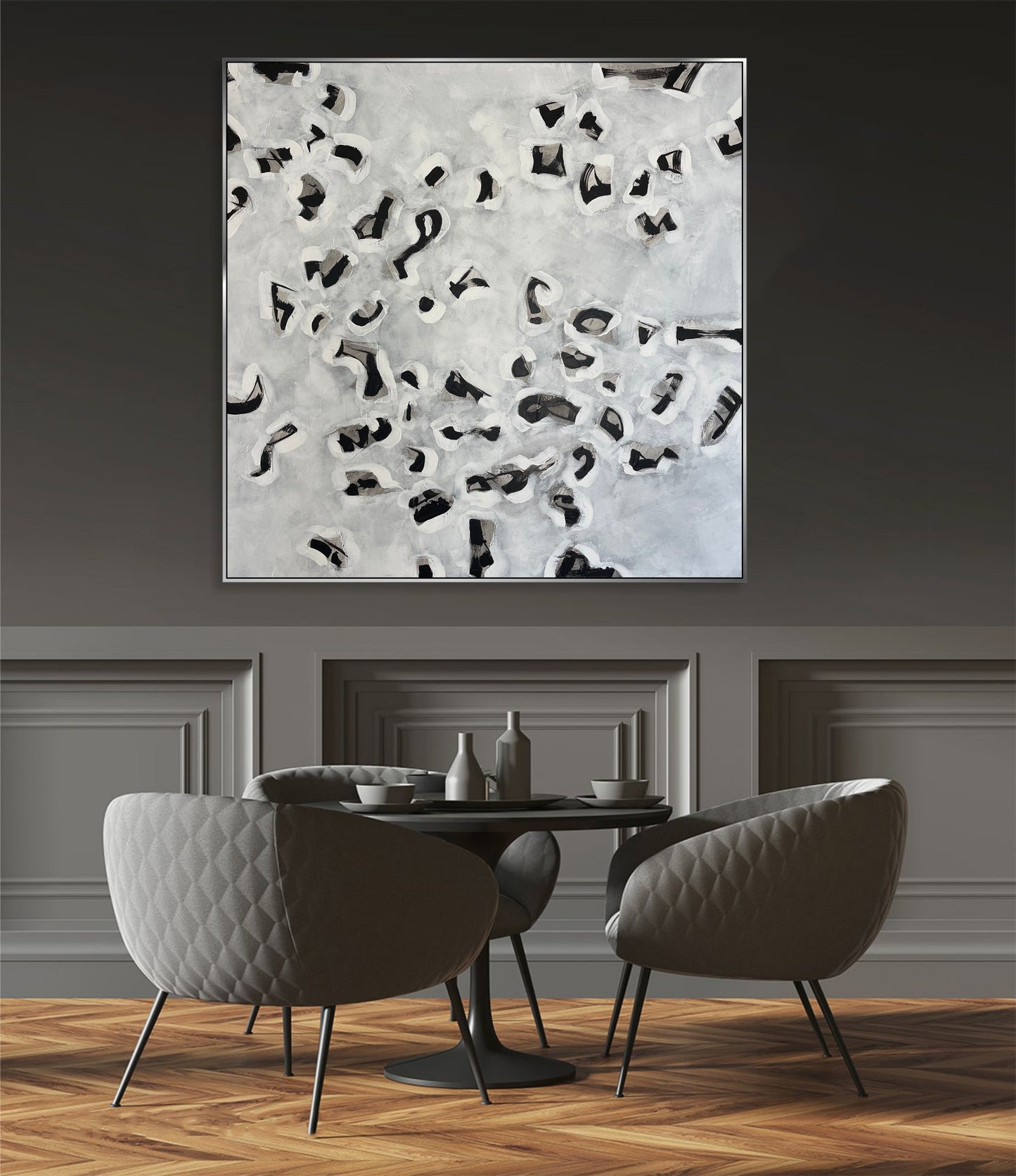 two chairs and a table in a room