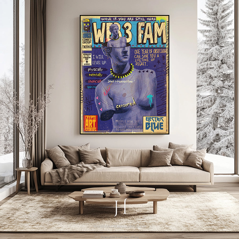 a living room with a couch and a poster on the wall