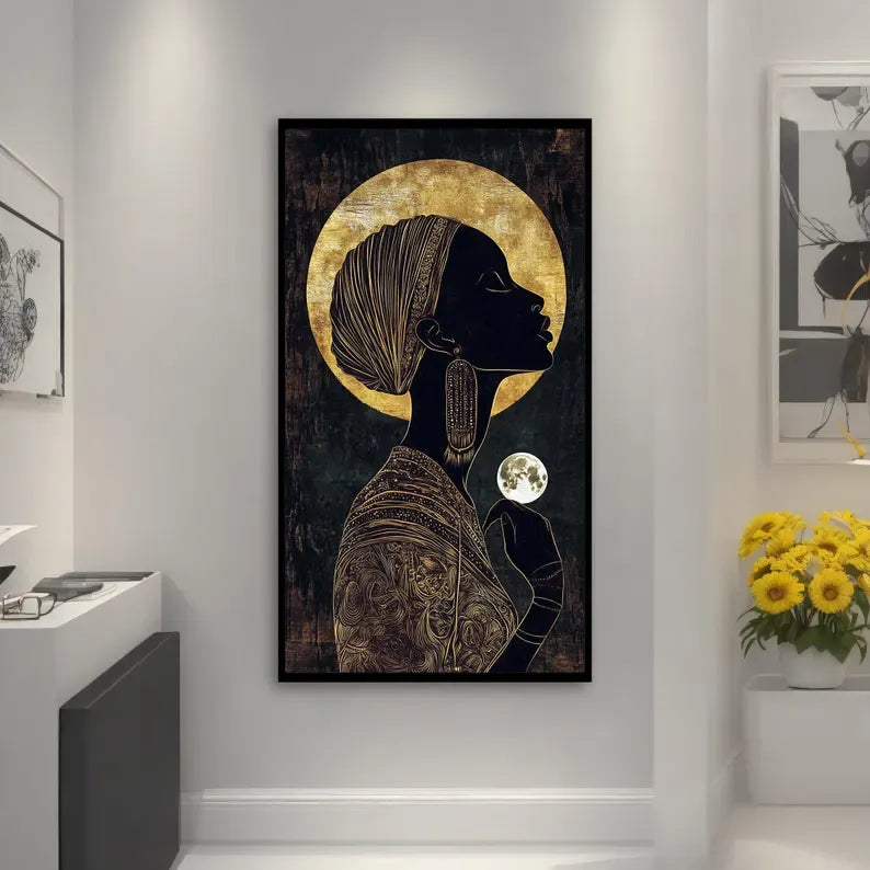 a large framed artwork depicting a woman with a headdress, set against a dark background with a golden circle above her head.
