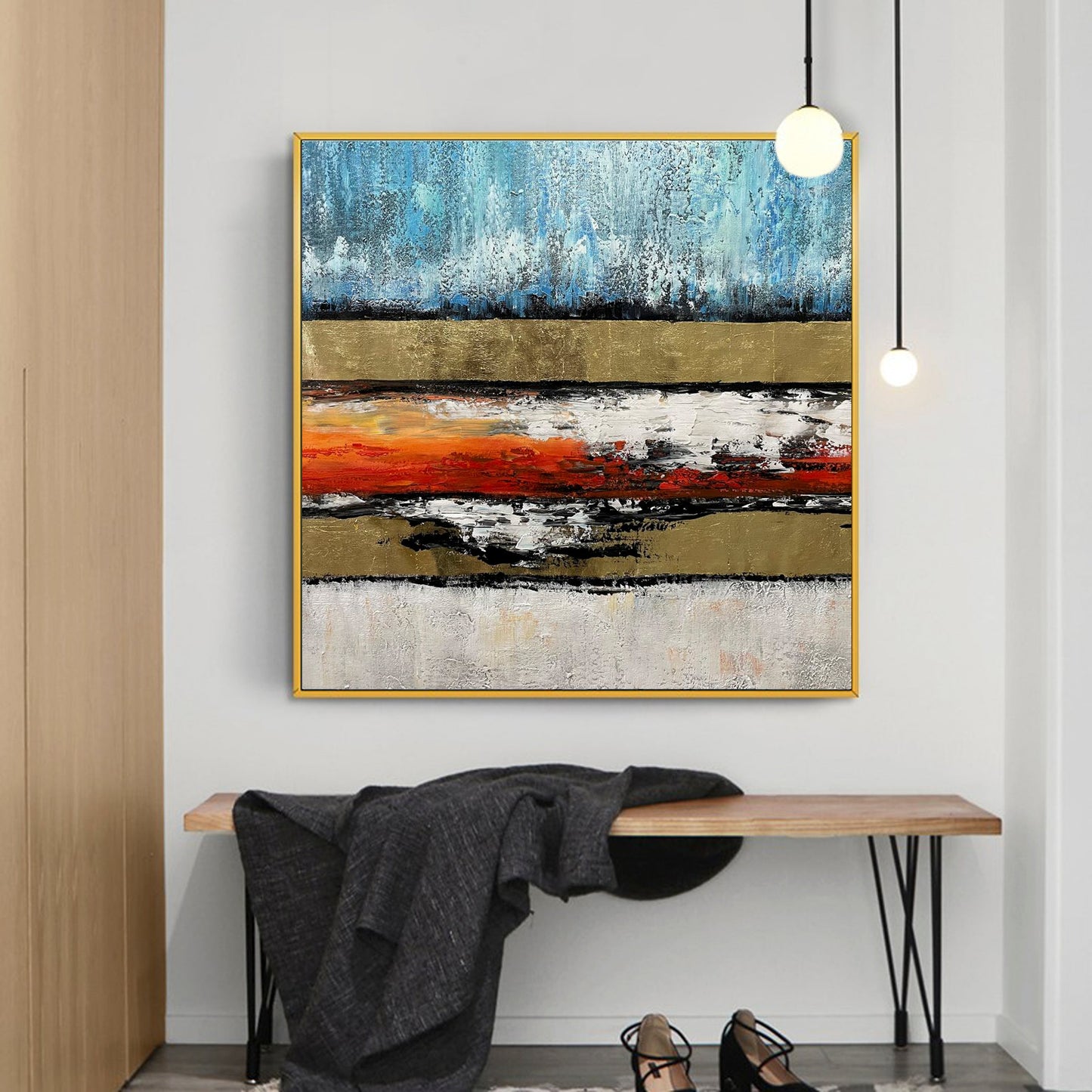 a painting hanging on a wall above a bench