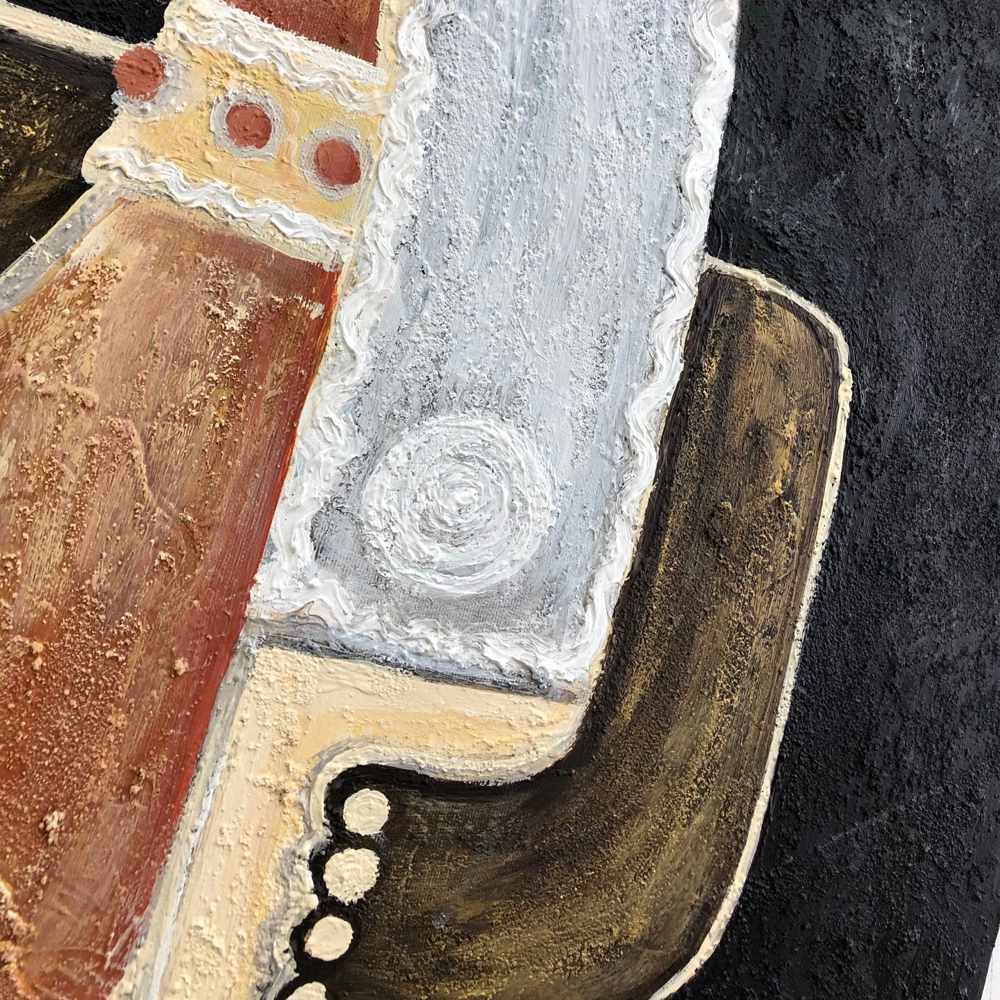 The image is a close-up of an abstract painting with a mix of colors and textures, including a white circular shape, a brown and black pattern, and a red and orange background.