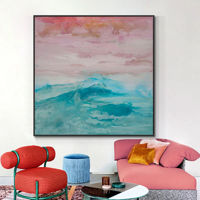 a living room filled with furniture and a painting on the wall