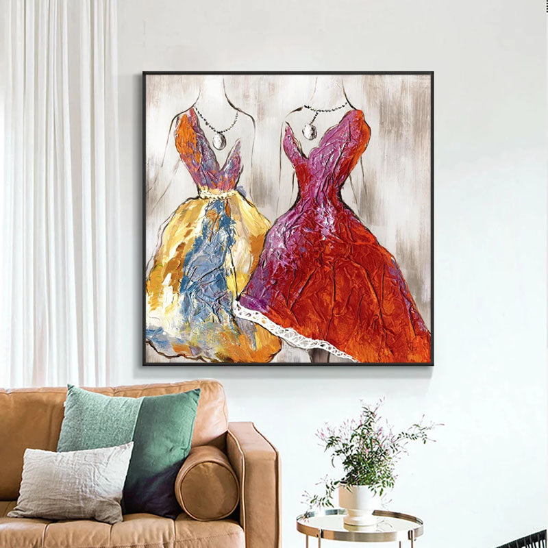 a living room with a couch and a painting on the wall