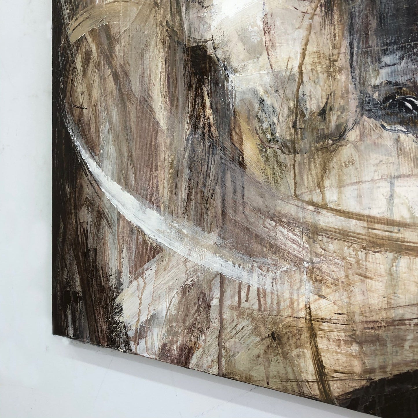 a painting of a woman's face on a wall