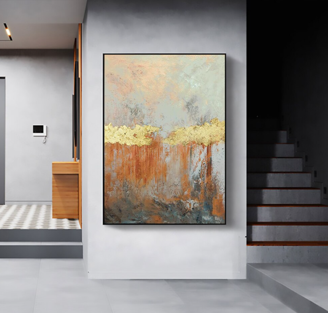 a painting hanging on a wall next to a stair case
