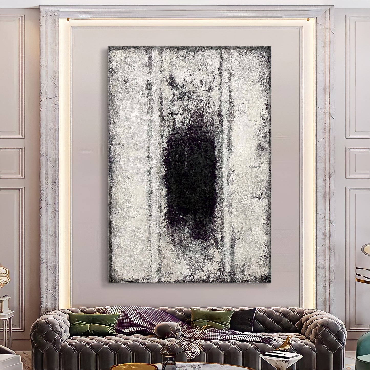 a living room with a couch and a painting on the wall