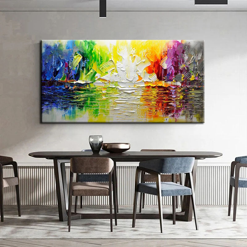 a dining room table with chairs and a painting on the wall
