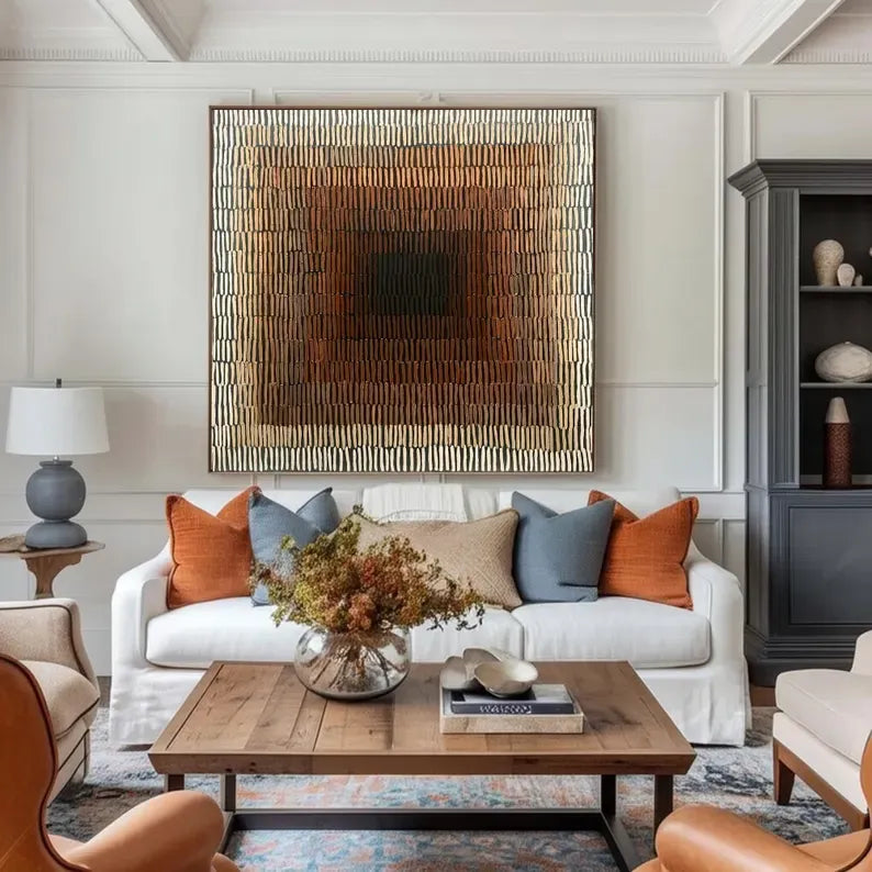 a modern living room with a white sofa, a wooden coffee table, and a large abstract painting on the wall.