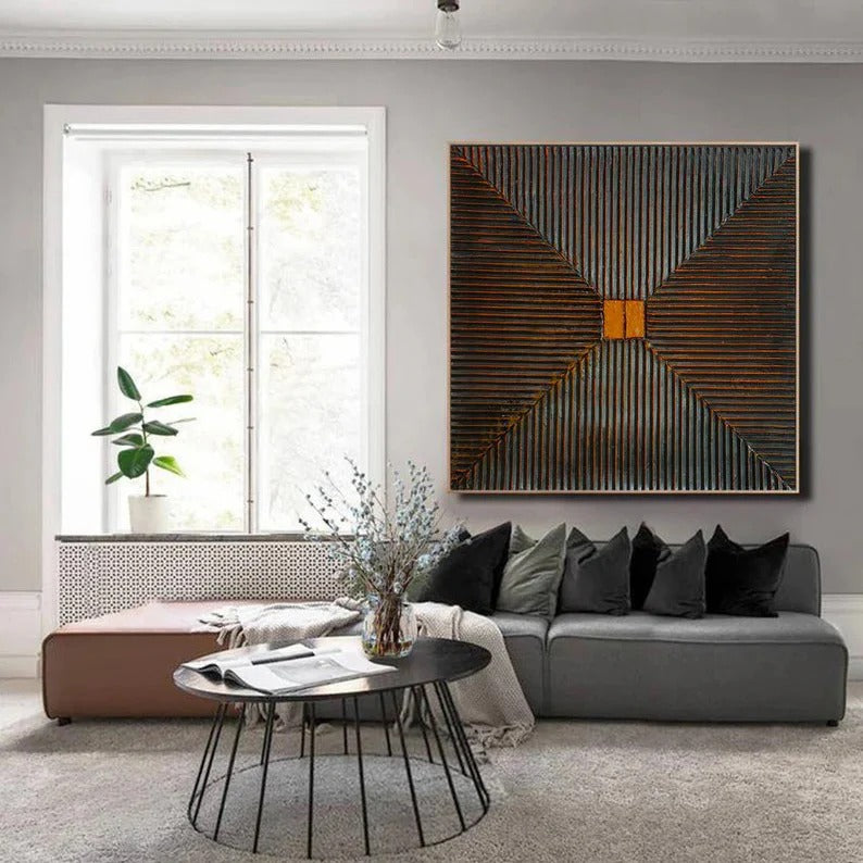 a modern living room with a gray sofa, a black coffee table, and a large abstract painting on the wall.