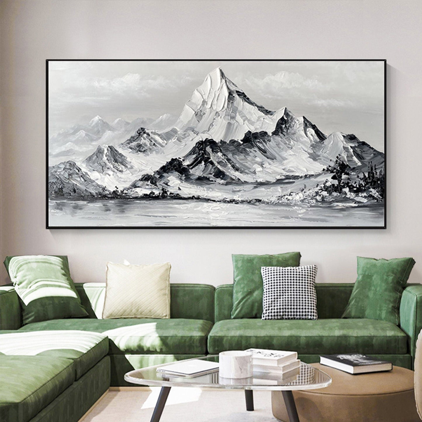 a living room with a green couch and a painting on the wall