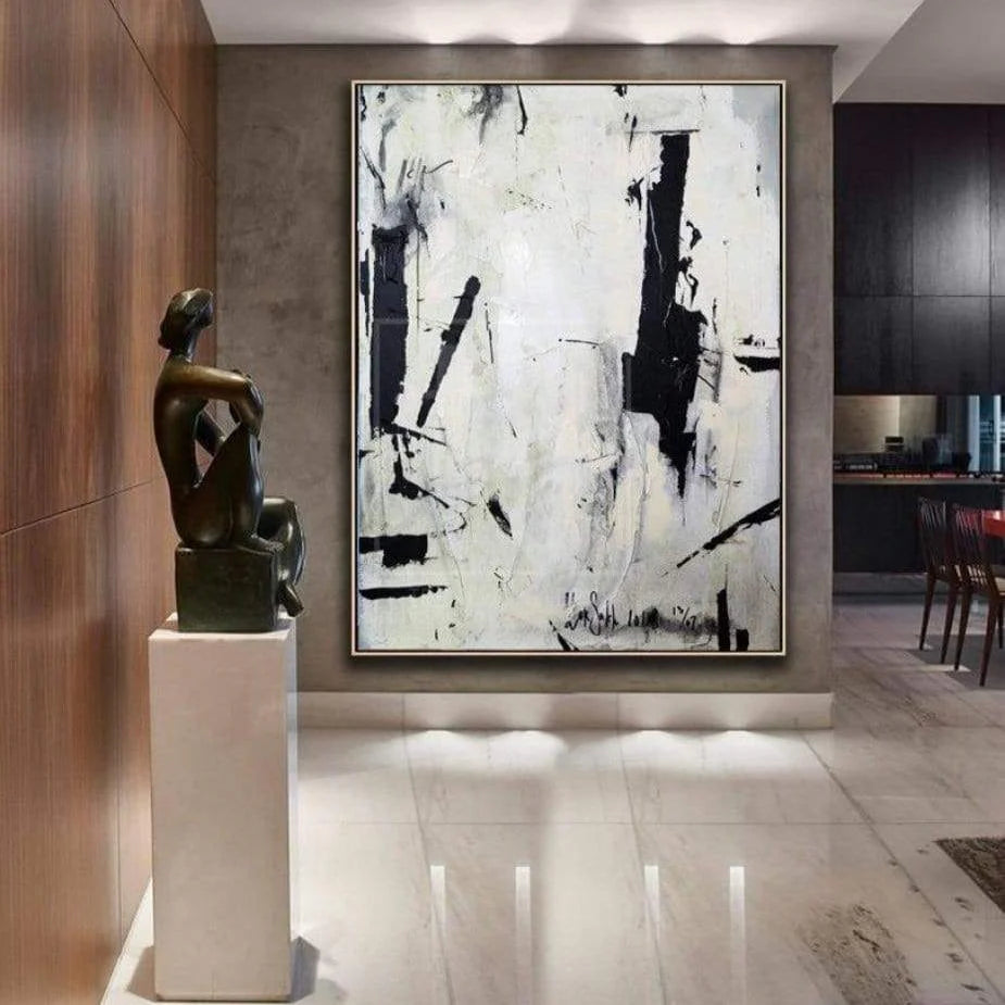 a modern art piece with a large abstract painting on the wall, a bronze sculpture of a seated figure, and a marble floor.