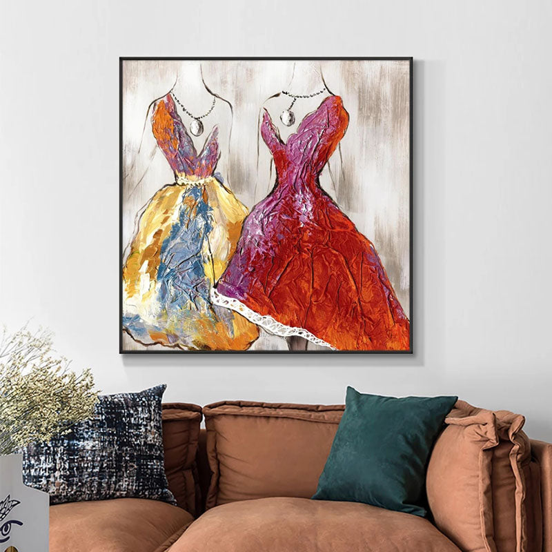 a living room with a couch and a painting on the wall