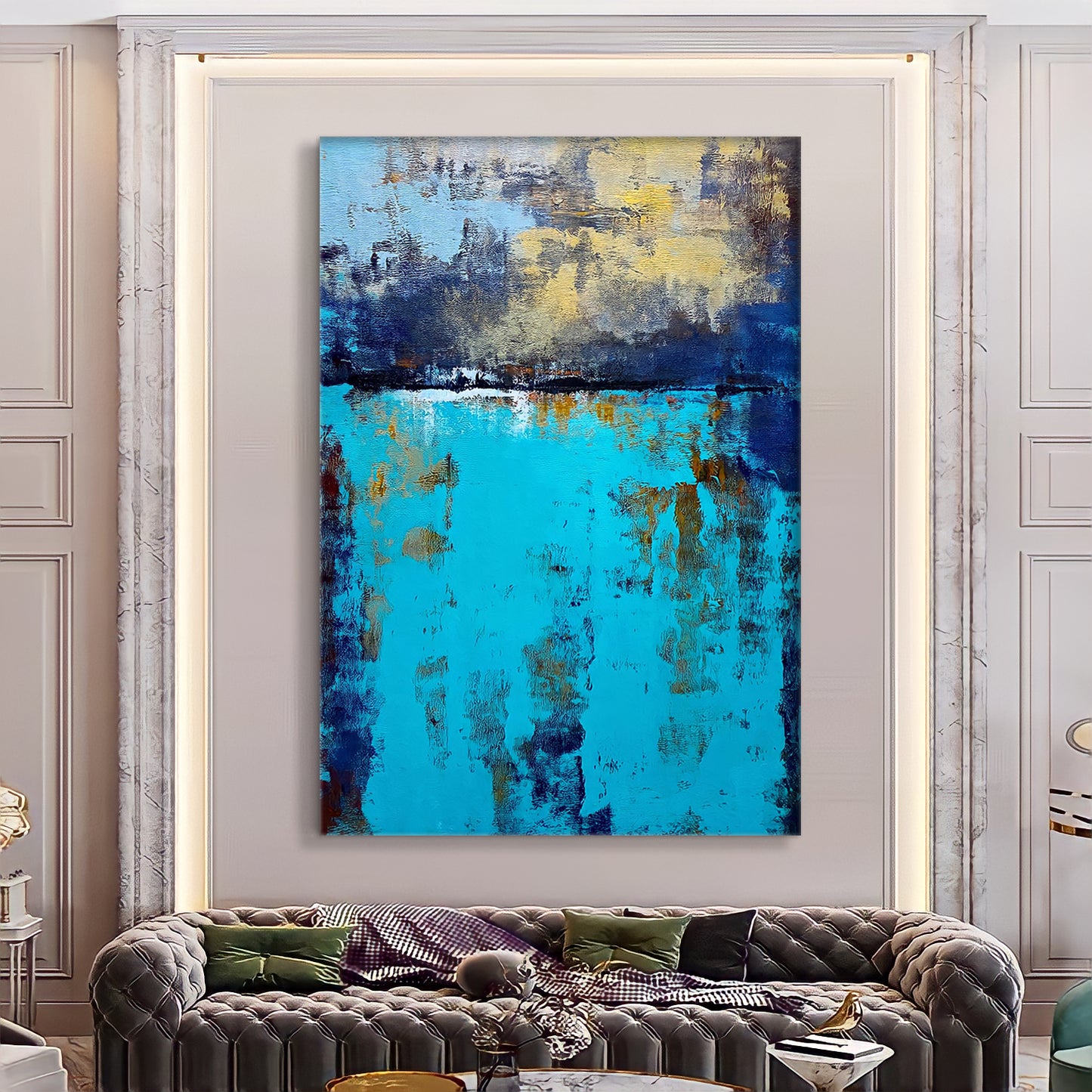 a living room with a couch and a painting on the wall