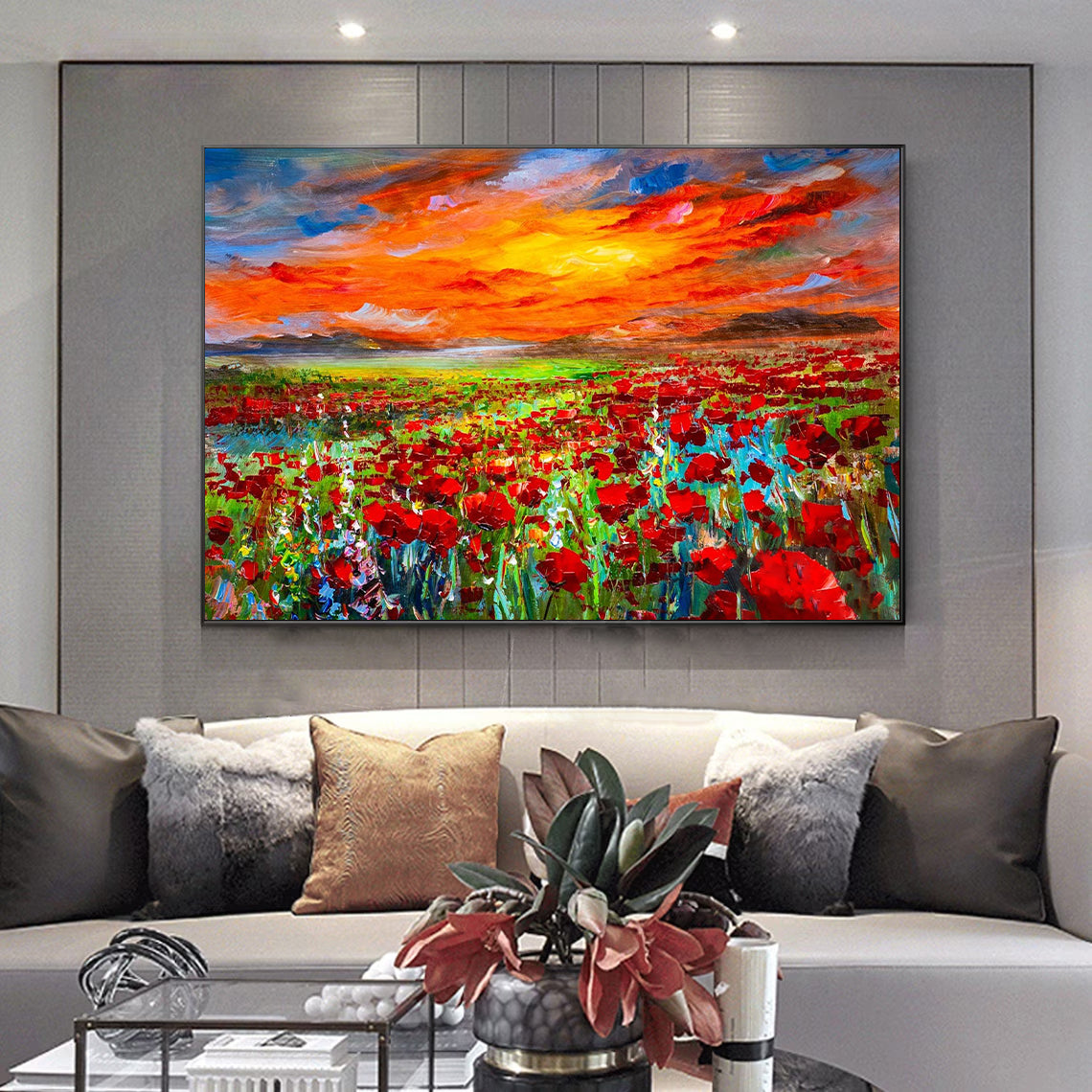 a living room with a couch and a painting on the wall
