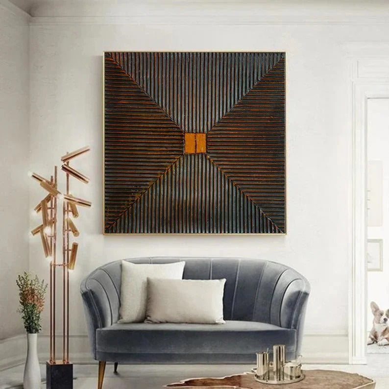 a modern living room with a gray sofa, a large abstract painting on the wall, and a decorative plant in a tall white vase.