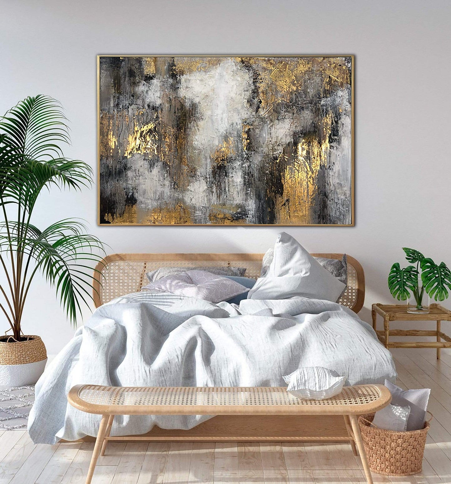 a bedroom with a bed and a painting on the wall