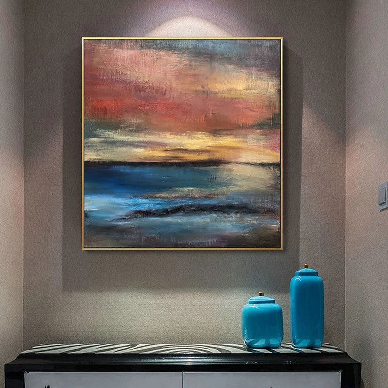 a painting hanging on a wall above a dresser
