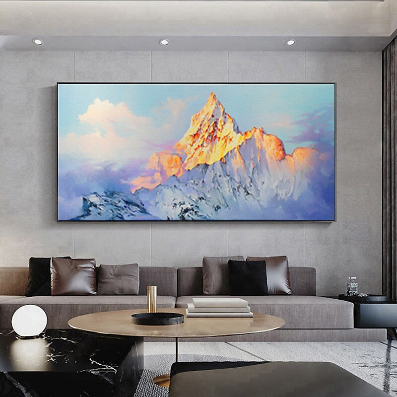 a living room with a large painting on the wall