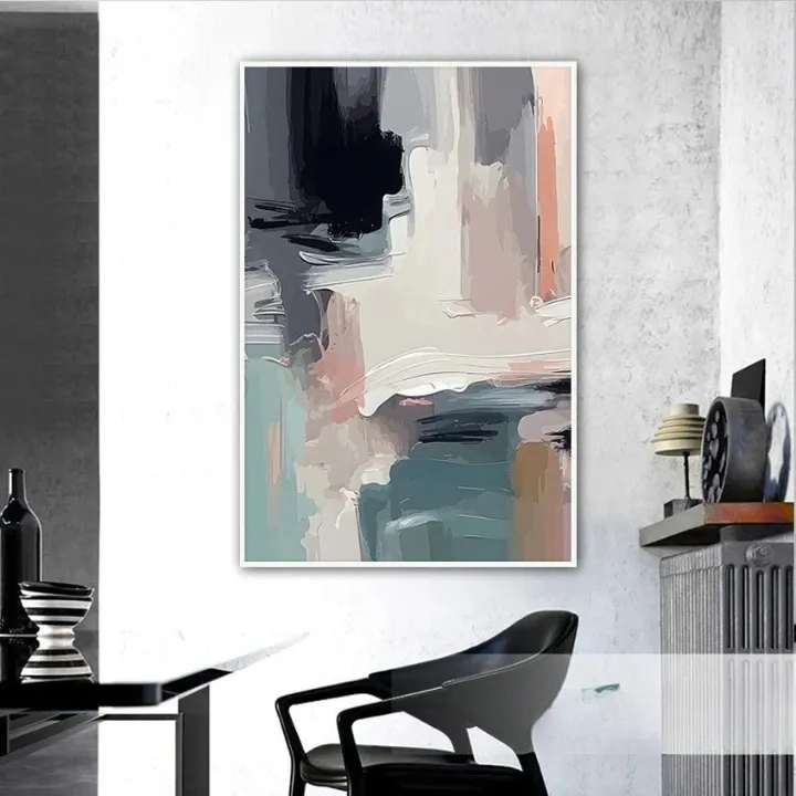 a modern abstract painting hanging on a wall in a minimalist living room setting.