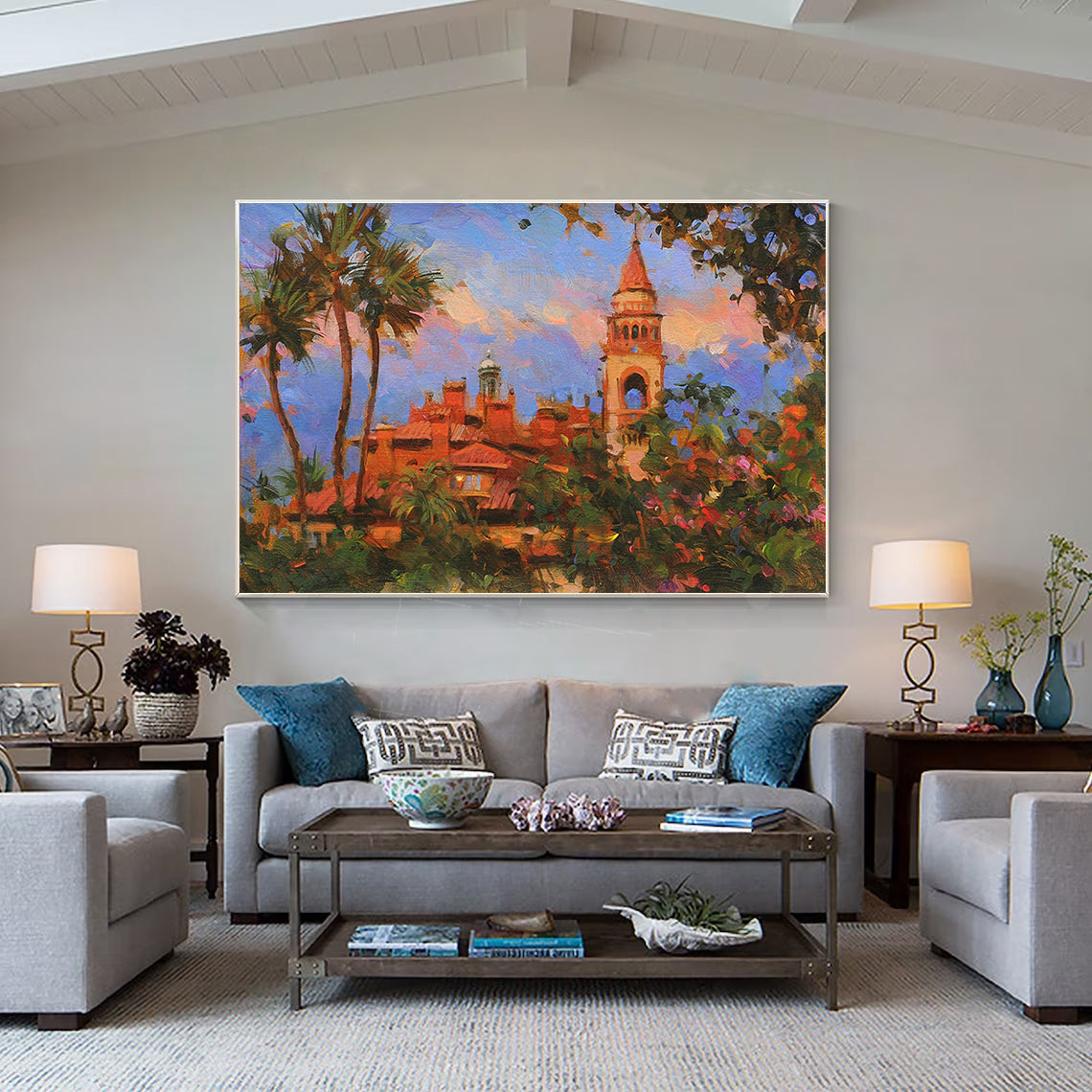 a living room filled with furniture and a painting on the wall