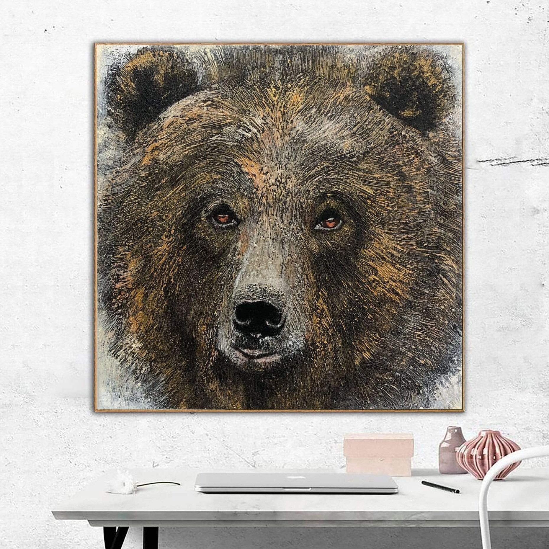 a painting of a brown bear on a white wall