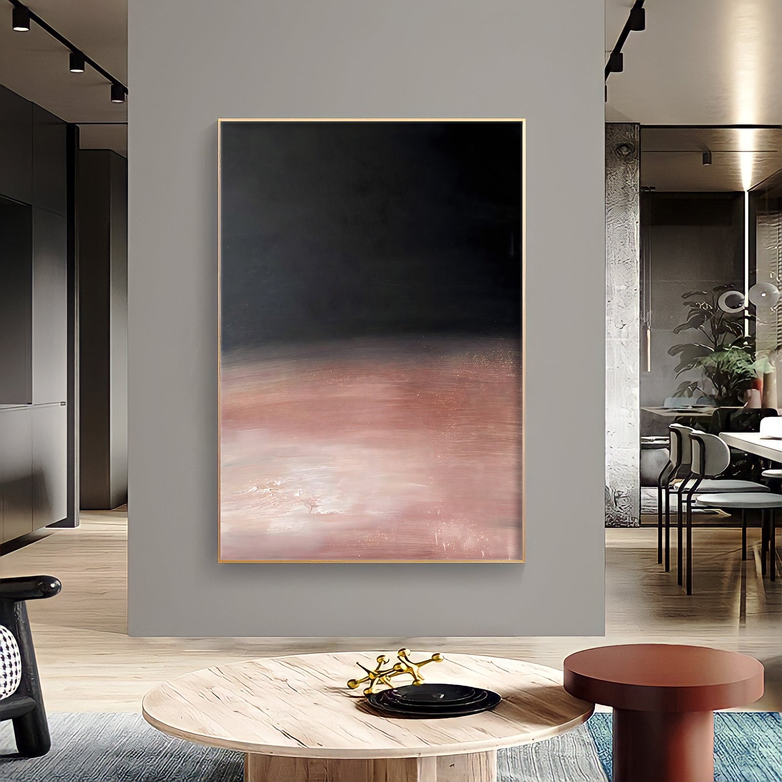 a living room with a large painting on the wall