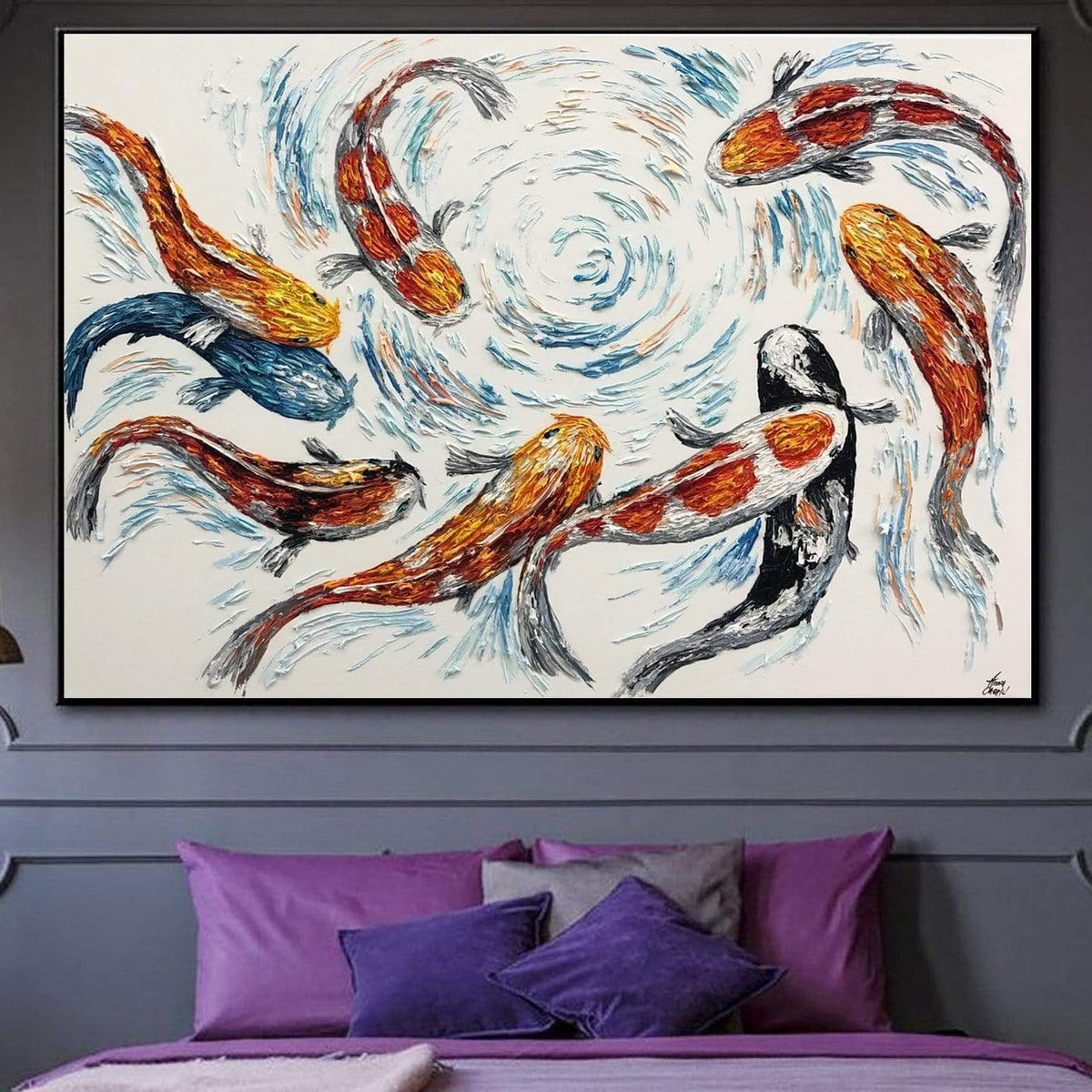 a large painting of colorful fish swimming in a swirling pattern, displayed on a wall above a bed with purple pillows.