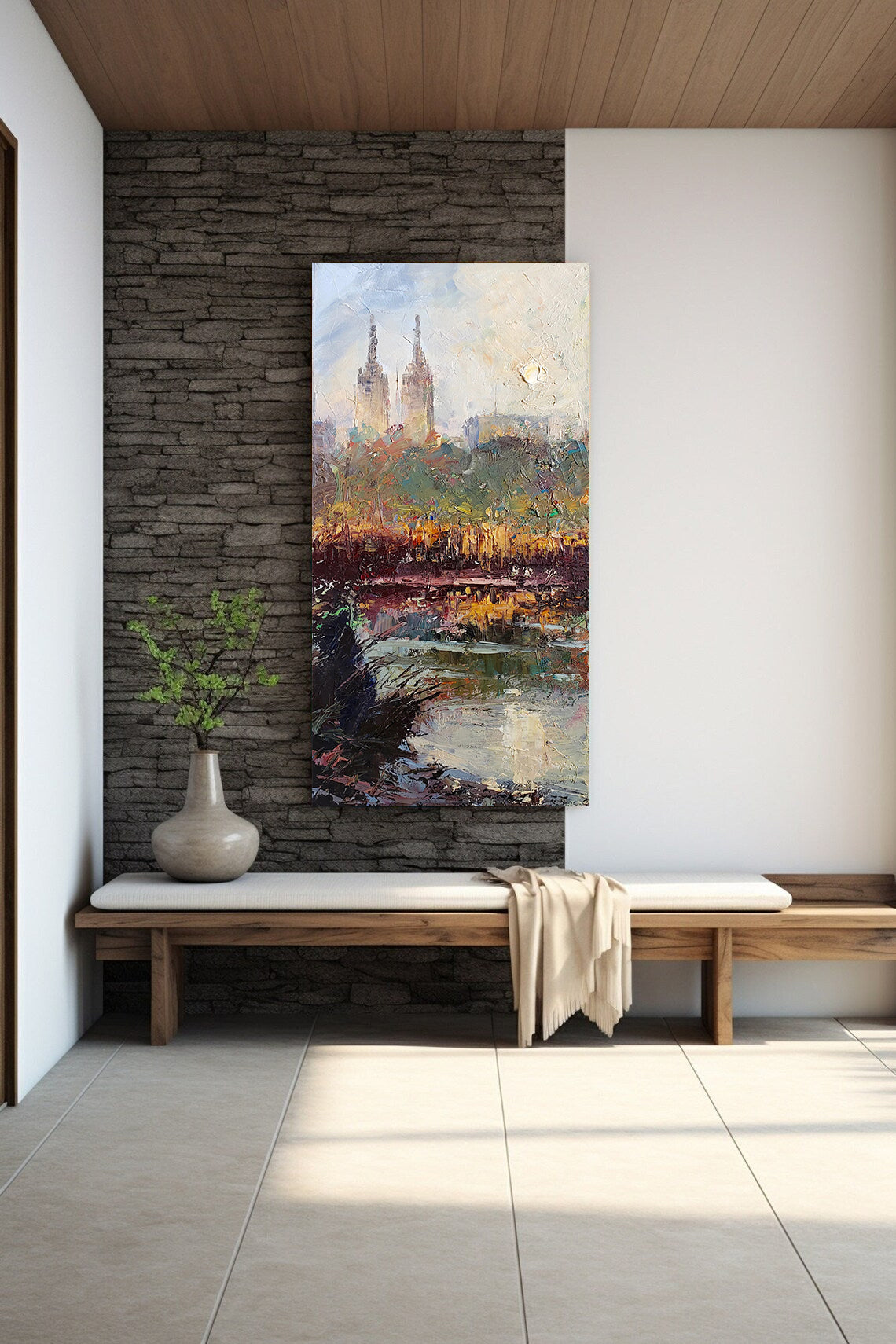 a painting hanging on a wall next to a bench