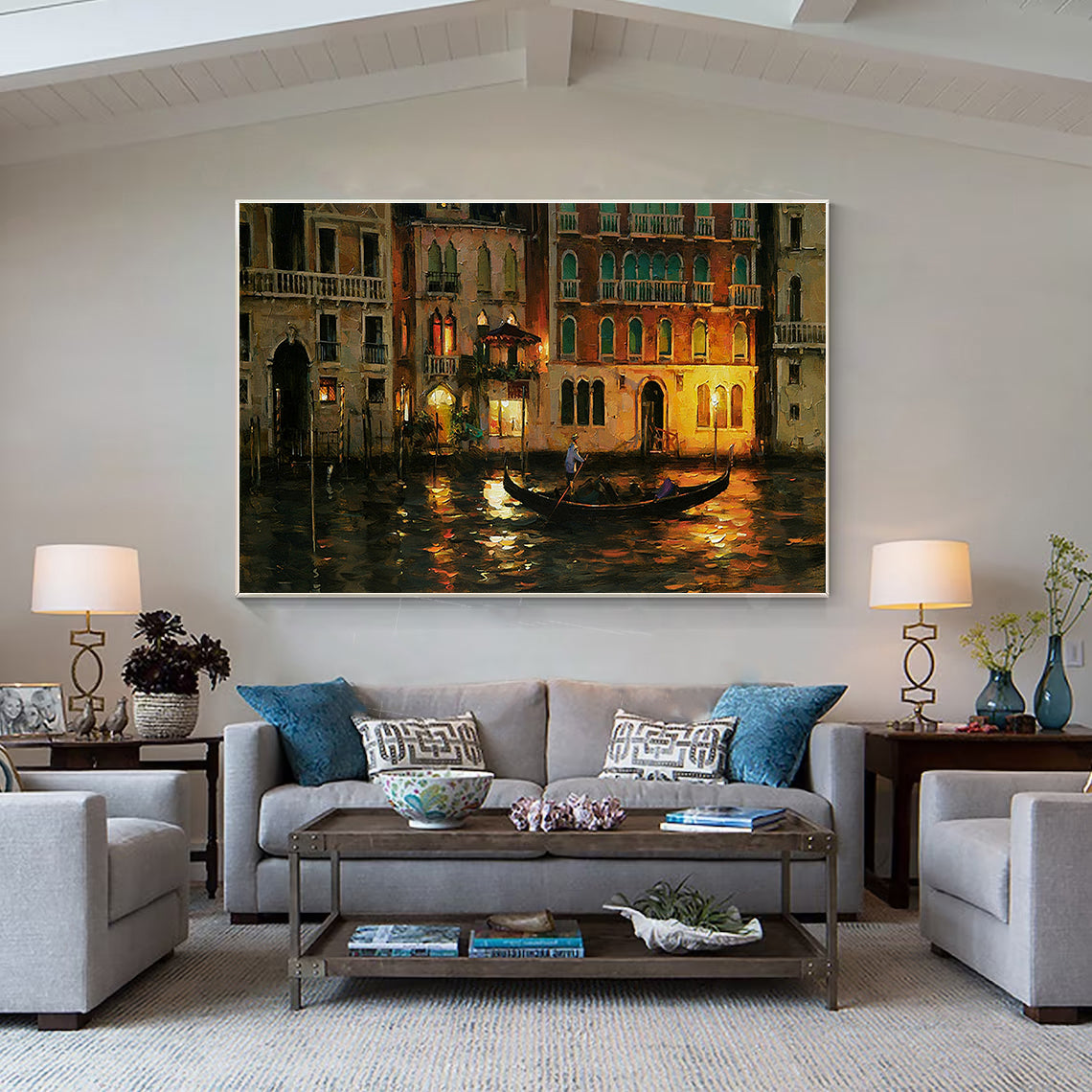 a living room filled with furniture and a painting on the wall