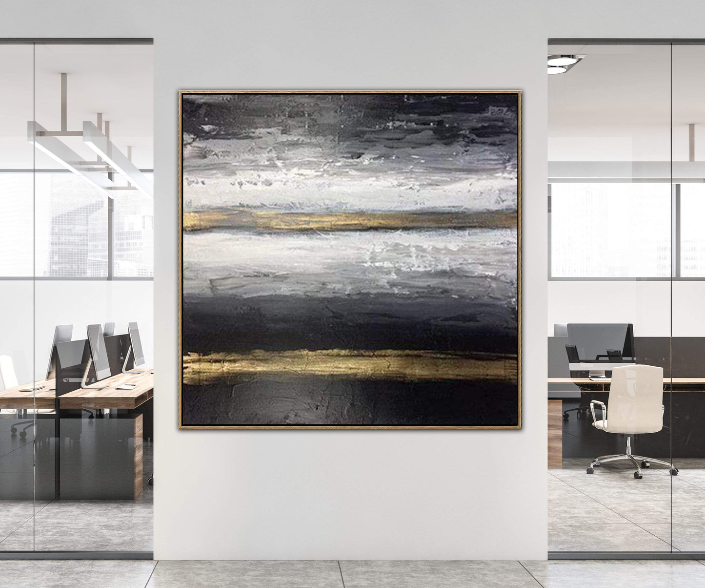 a painting hanging on a wall in an office