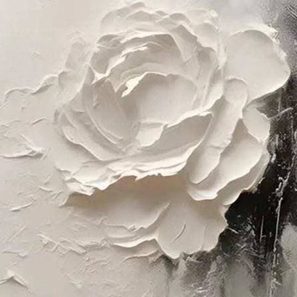a close-up view of a white, textured flower petal.