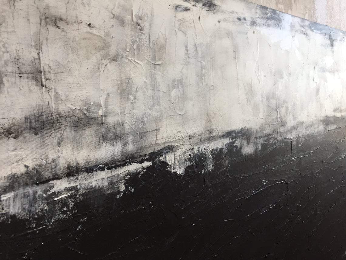 a black and white painting on a wall