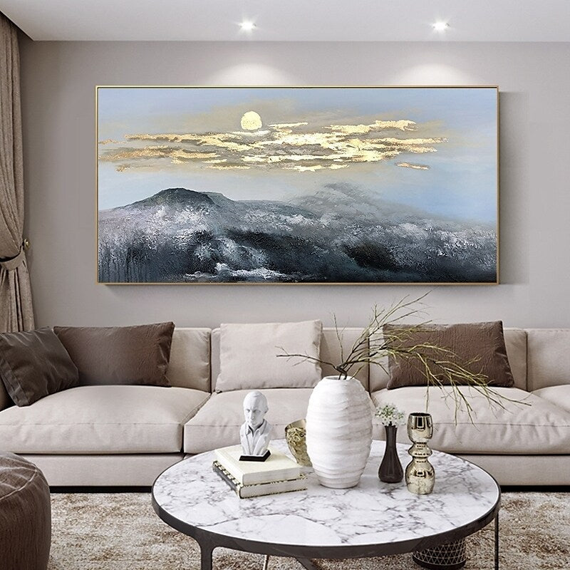 a living room with a large painting on the wall